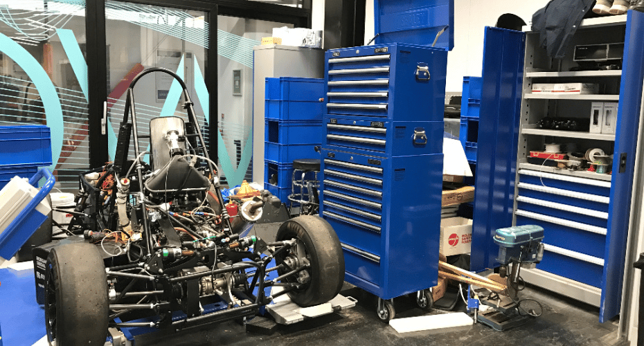 A vehicle and toolboxes in the Vehicle Assembly Area